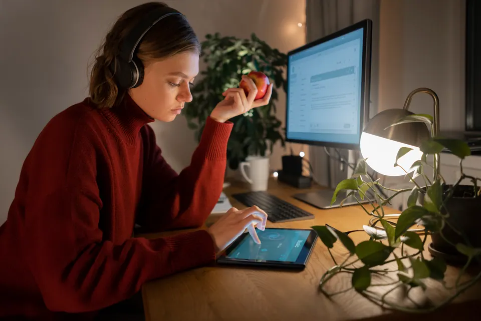 Person working late night computer home